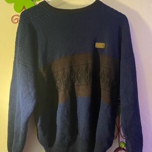 Blue and Black Sweater with Gold Pendant Detailing